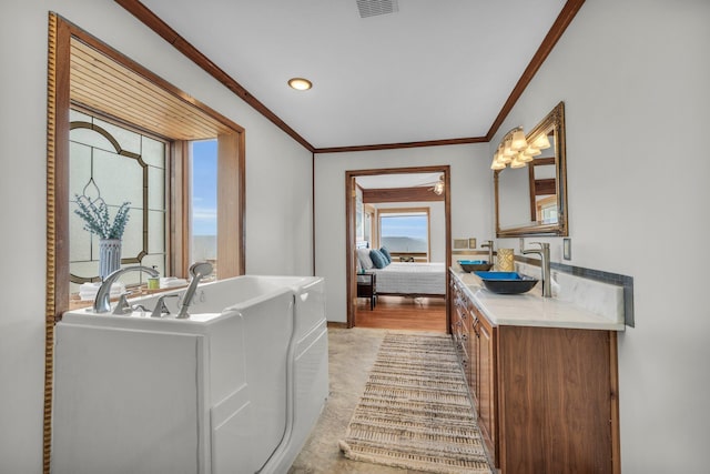 bathroom featuring vanity and ornamental molding