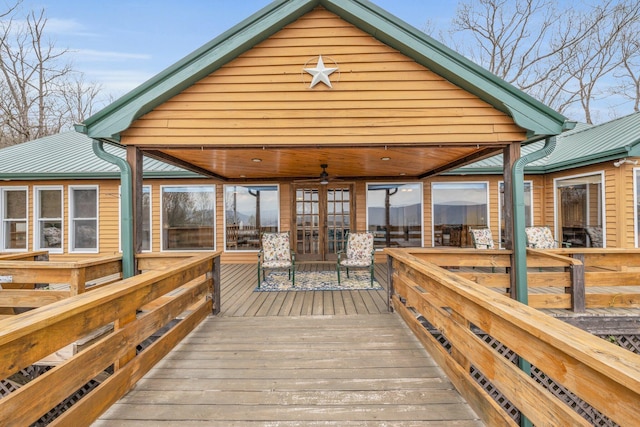 wooden deck with ceiling fan