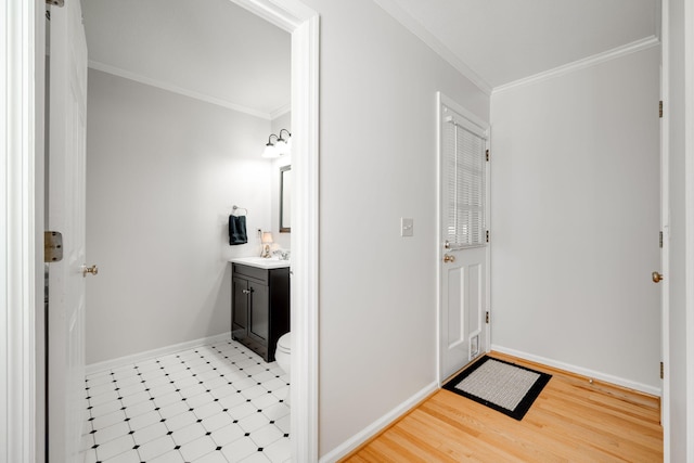 bathroom with vanity, ornamental molding, toilet, and hardwood / wood-style floors