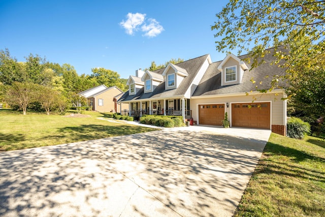 cape cod home with a garage, a front lawn, covered porch, and driveway