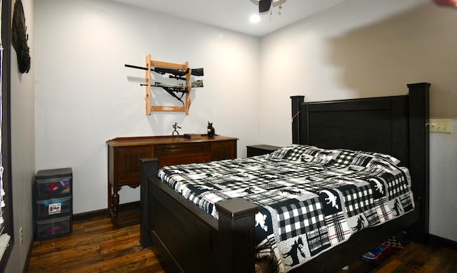 bedroom featuring dark hardwood / wood-style flooring