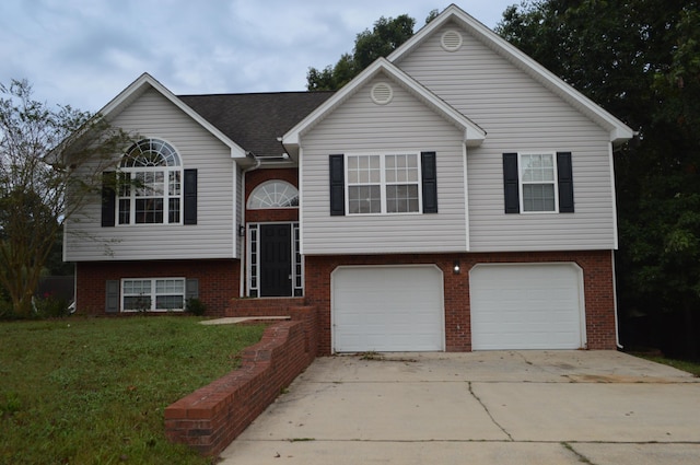211 Elaine Dr, Flintstone, GA 30725 - bi-level home with a front lawn and a garage
