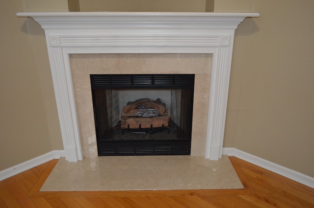 interior details featuring hardwood / wood-style floors