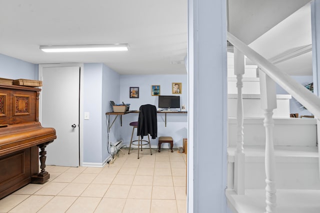 tiled home office featuring built in desk