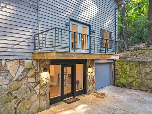 exterior space with a patio area and a garage