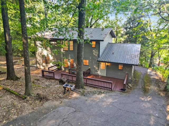 view of front of property featuring a wooden deck