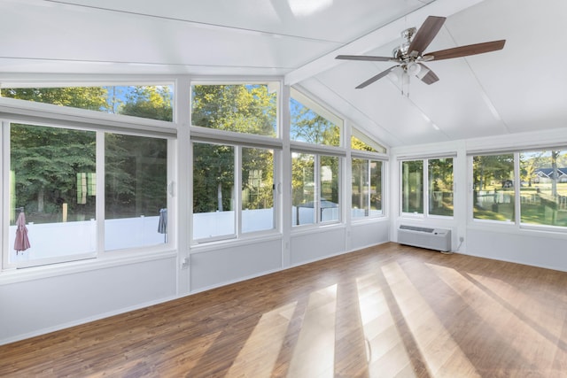 unfurnished sunroom with lofted ceiling with beams, a wall mounted air conditioner, and ceiling fan