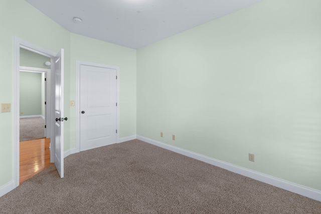 unfurnished bedroom featuring carpet flooring