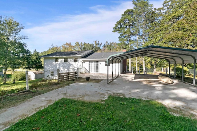 view of parking with a carport