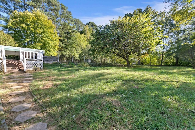 view of yard featuring a deck