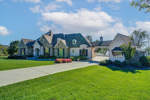 french country home with a front yard