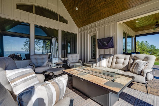 view of patio / terrace featuring a fire pit and ceiling fan