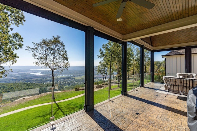 view of patio / terrace featuring ceiling fan