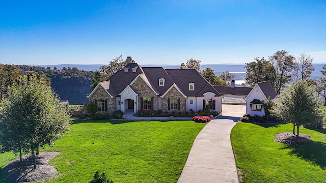 view of front of home with a front lawn