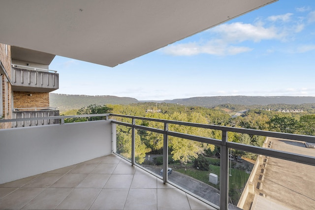 balcony featuring a mountain view