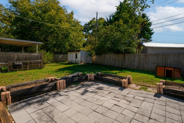 view of patio featuring a storage shed