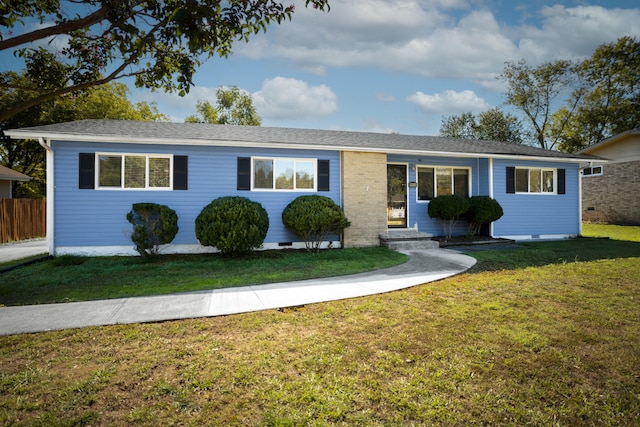 single story home with a front yard