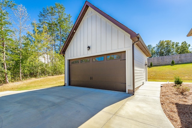 garage with a lawn