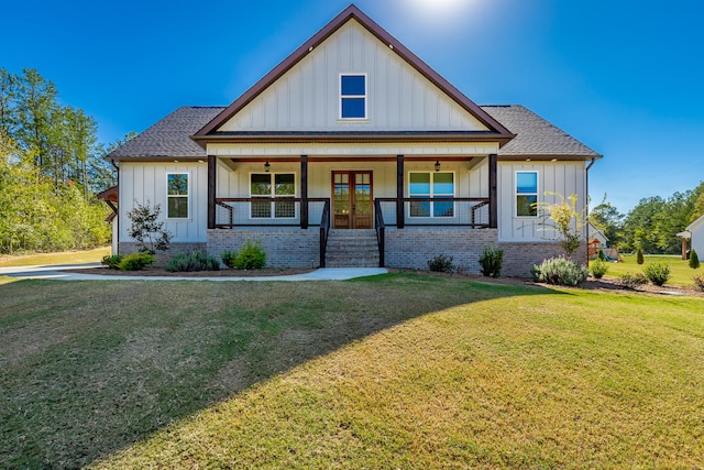 view of front of property with a front lawn and a porch