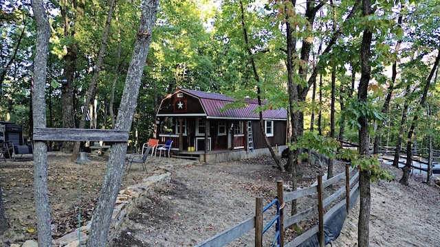 view of front of home with an outbuilding