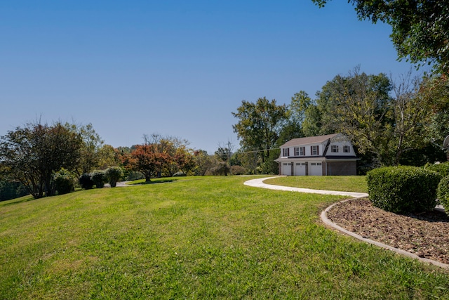 view of yard with a garage