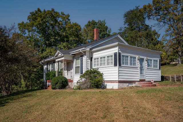 view of front of house with a front yard