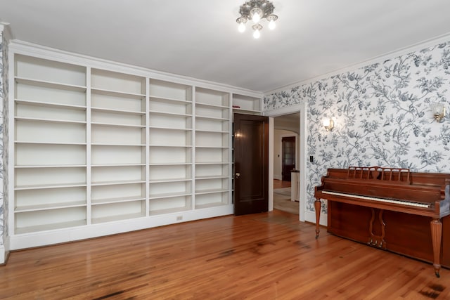 misc room featuring crown molding and hardwood / wood-style floors