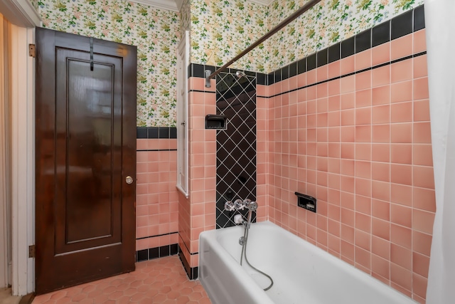 bathroom featuring tile patterned flooring and tiled shower / bath combo