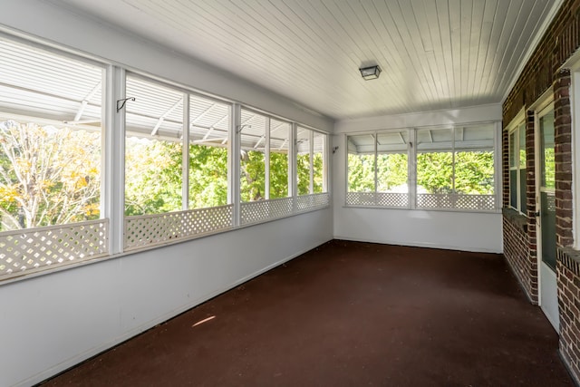 unfurnished sunroom with a wealth of natural light