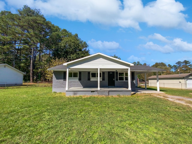 view of front of house featuring a patio area and a front yard