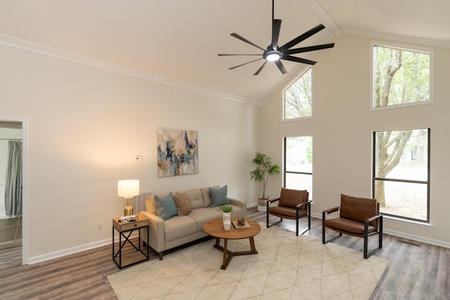 living room with light hardwood / wood-style floors, plenty of natural light, and ceiling fan