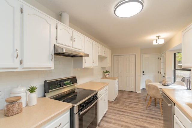 kitchen with dishwasher, white cabinetry, light wood-type flooring, and electric stove