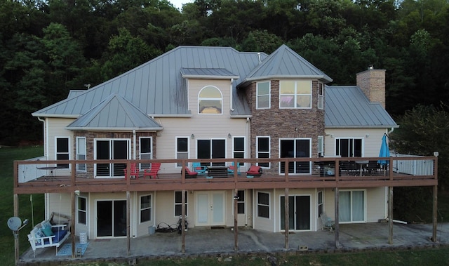 rear view of house featuring a patio