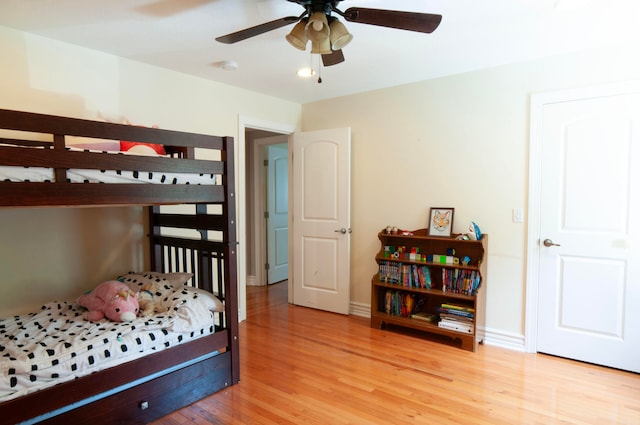 bedroom featuring light hardwood / wood-style floors and ceiling fan