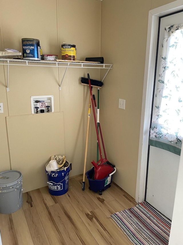 washroom with light hardwood / wood-style flooring