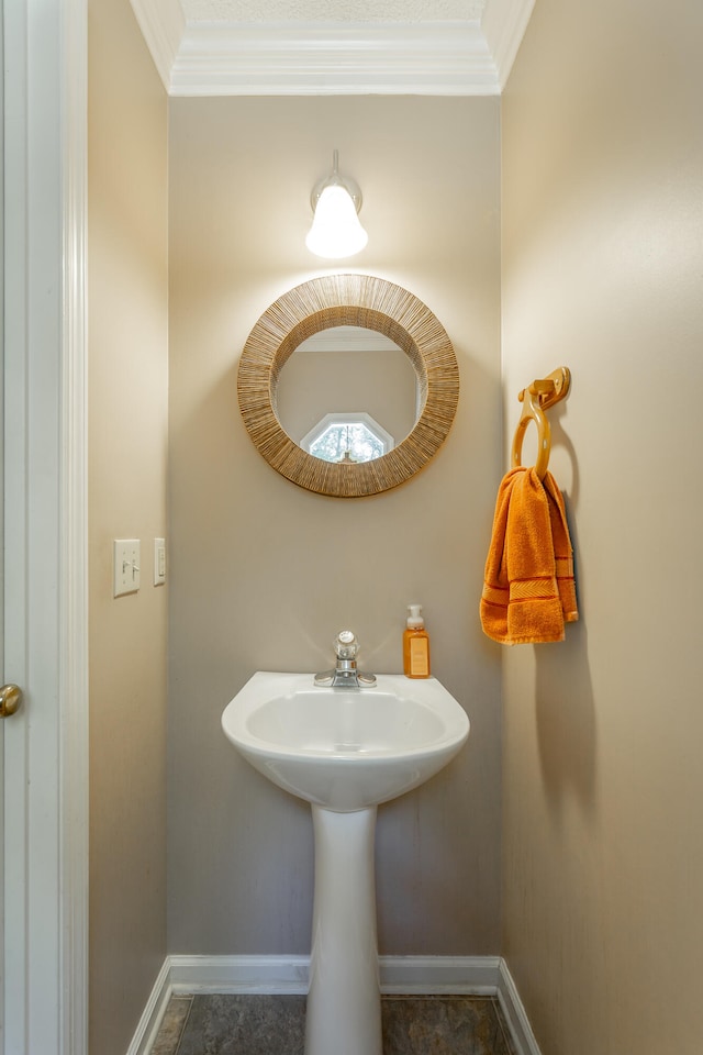 bathroom with crown molding