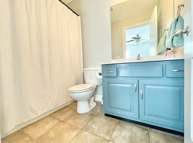 bathroom featuring toilet, tile patterned flooring, a shower with shower curtain, vanity, and ceiling fan