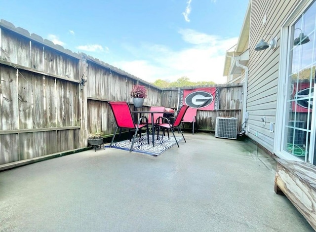 view of patio featuring cooling unit