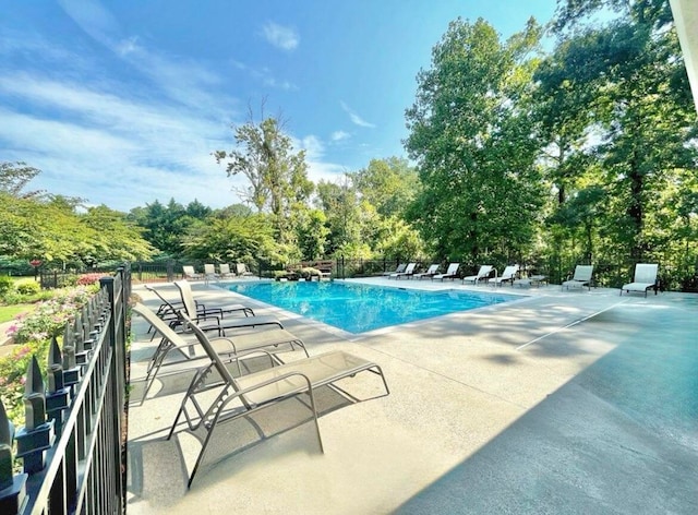 view of pool featuring a patio