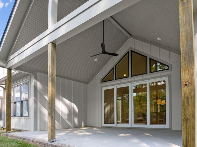 view of side of property with ceiling fan