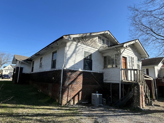 view of property exterior with cooling unit