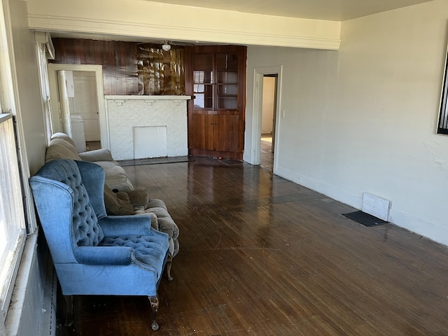 living room with dark hardwood / wood-style floors