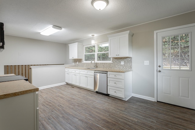 kitchen featuring dishwasher, white cabinetry, dark wood-type flooring, and plenty of natural light