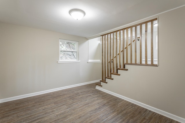 stairs featuring wood-type flooring