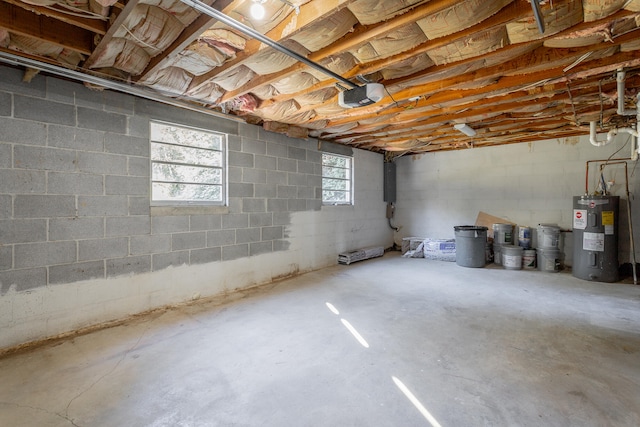 basement with electric panel and water heater