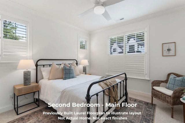 bedroom with carpet floors, ceiling fan, and crown molding