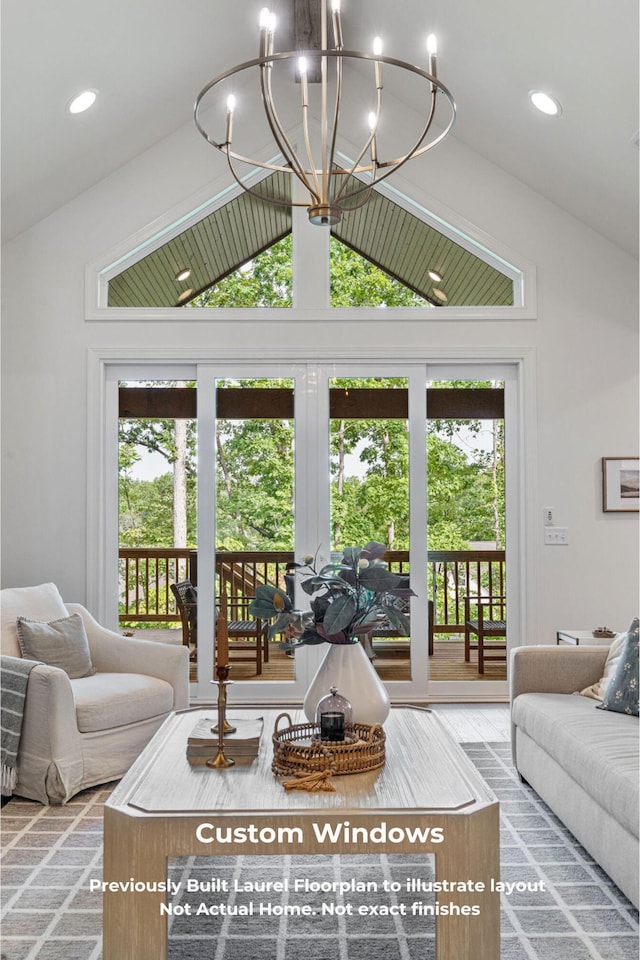 living room with a chandelier, french doors, a wealth of natural light, and vaulted ceiling