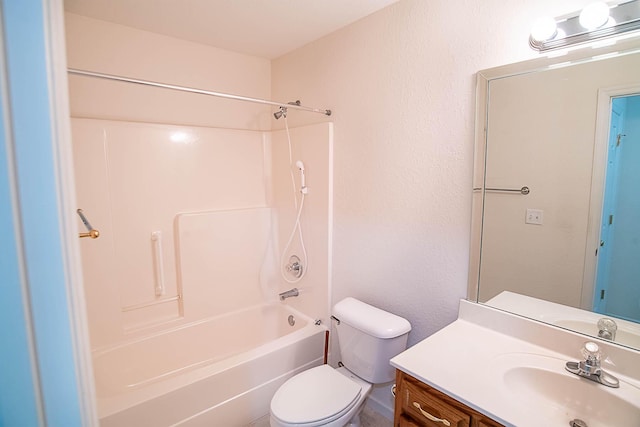 full bathroom featuring vanity, tub / shower combination, and toilet