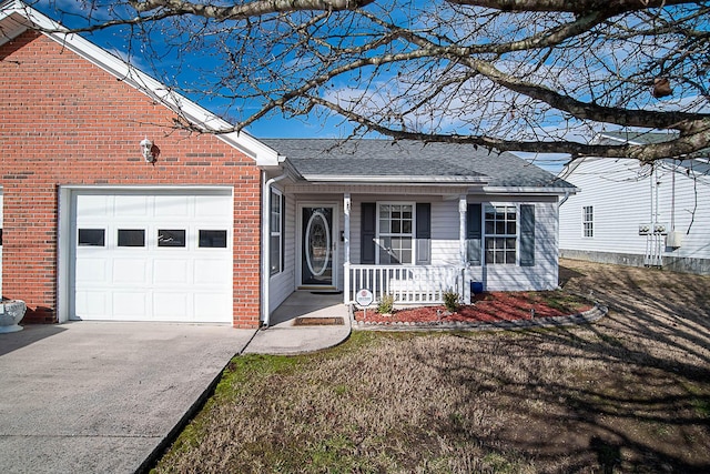 ranch-style house featuring a porch and a garage