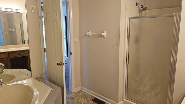 bathroom featuring vanity and plus walk in shower